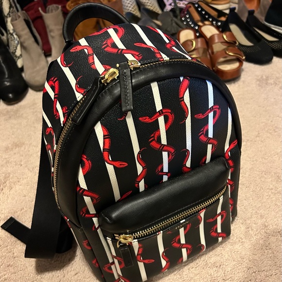 Flynn leather backpack with snake pattern and gold accents main image 7